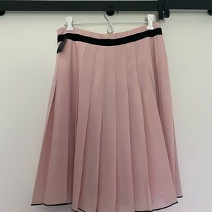 Pleated pink skirt. NWT, size 8. Gross grain ribbon and black stitch